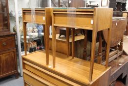 A pair of 1970's teak bedside tables.
