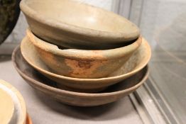 Four Chinese pottery bowls.