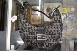 A Fendi Logo bag.