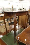 A mahogany two tier occasional table.