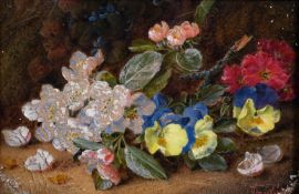 Vincent Clare (1855-1930) British, A still life of mixed flowers in a naturalistic setting, oil on