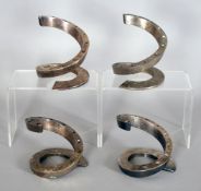 A set of four spiral candlesticks designed by Bertil Vallien for Dansk, silverplated, 5.25