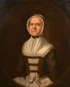 An 18th century half-length portrait of a lady in a lace headdress, possibly American, oil on