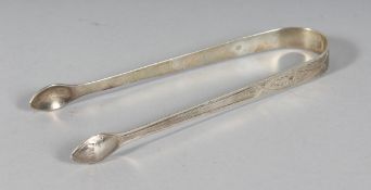 A PAIR OF GEORGE III BRIGHT CUT SUGAR TONGS. London 1796.