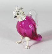 A SMALL CRANBERRY GLASS CLARET JUG with plated head, collar and feet. 6.5ins high.