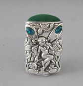 A SILVER FAIRY PIN CUSHION. 1.5ins.