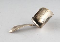 A GEORGE III SHOVEL SHAPED CADDY SPOON. Birmingham 1910.