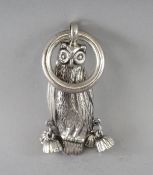 A SILVER OWL RATTLE AND TEETHER.