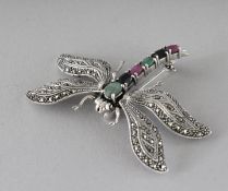 A SILVER, RUBY, EMERALD AND SAPPHIRE DRAGONFLY BROOCH.