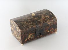 AN 18TH CENTURY DOMED PAPER COVERED CASKET on four bun feet. 7ins wide.