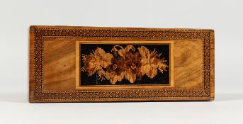 A TUNBRIDGE WARE PEN BOX, the top inlaid with flowers. 9ins long.