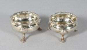 A PAIR OF CIRCULAR SALTS. London 1753 and 1760.