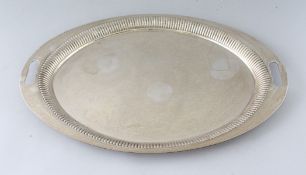 A HEAVY SILVER OVAL TEA TRAY. 18.5ins long. Sheffield 1905. Maker: Mappin & Webb. Weight 54ozs.