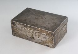 AN ENGINE TURNED CIGARETTE BOX with cedarwood liner. 5.25ins long. London 1822.