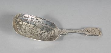 A GEORGE III BRIGHT CUT CADDY SPOON. Birmingham 1818.
