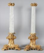A SUPERB PAIR OF ROCK CRYSTAL AND ORMOLU LAMPS. 25ins high.