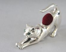 A SILVER CAT PIN CUSHION. 1.75ins.