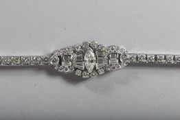 A SUPERB PLATINUM AND DIAMOND BRACELET.