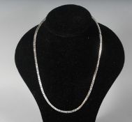 A SILVER CZ LINE NECKLACE.