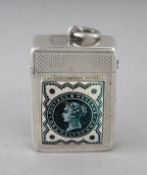 A VICTORIAN ENGRAVED SILVER VESTA CASE, Birmingham 1898, with an enamel half penny stamp.