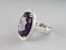 A GOOD 18CT WHITE GOLD, AMETHYST AND DIAMOND RING, approx. 19cts.