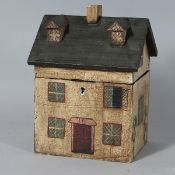 A REPRODUCTION HOUSE TEA CADDY. 8ins high.