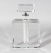 A CHANEL STYLE RECTANGULAR SCENT BOTTLE AND STOPPER. 10ins high.