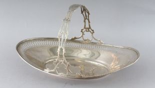 A STERLING SILVER PIERCED OVAL CAKE BASKET with handle. Weight 12ozs.
