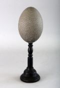 AN EMU EGG on a stand. 5ins.