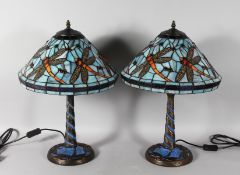 A GOOD PAIR OF TIFFANY DESIGN BLUE DRAGONFLY LAMPS. 22ins high.