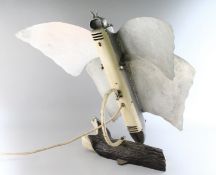 AN ART DECO TIN BUTTERFLY HEATER.