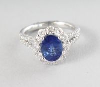 A SUPERB 18CT WHITE GOLD AND SAPPHIRE RING, 2.26, surrounded by 0.99 carats of diamonds.