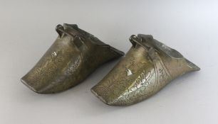 A PAIR OF 17TH CENTURY BRASS STIRRUPS.