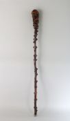 A ROOTWOOD WALKING STICK. 31ins long.