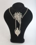 A SILVER CHATELAINE with a dog and deer medallion.