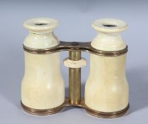 A GOOD PAIR OF MARINE IVORY OPERA GLASSES. 3.5ins, closed.