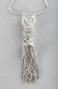 A GOOD CARTIER STYLE SILVER PANTHER TASSEL NECKLACE.