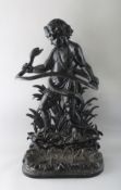 A LATE VICTORIAN CAST IRON STICK STAND, modelled as a young boy holding a snake. 2ft 8ins high x 1ft