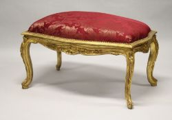 A GOOD GILT RED PADDED TOP WINDOW SEAT. 40ins long.