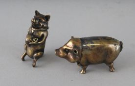 TWO CAST BRASS PIG VESTAS.