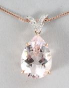 AN 18CT ROSE GOLD PEAR SHAPED MORGANITE (4.92cts) AND DIAMOND (0.07cts) PENDANT on a chain.