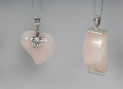 TWO SILVER MOUNTED QUARTZ PENDANTS.