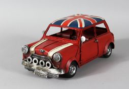 A TIN MINI. 11ins long.