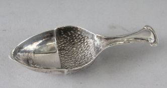A SILVER ACORN CADDY SPOON. 3.25ins.