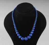 A BLUE LAPIS NECKLACE.