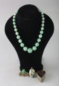 A HARDSTONE PENDANT, SNUFF BOX, BROOCH and GREEN STONE NECKLACE.