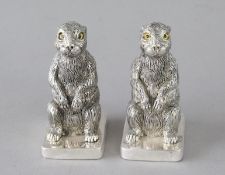 A PAIR OF CAST 800 RABBITS SALT AND PEPPERS. 2.25ins high.