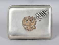 A RUSSIAN SILVER CIGARETTE CASE, with applied crest and inscription dated 1898. Stamped MAGALSKIPSYK
