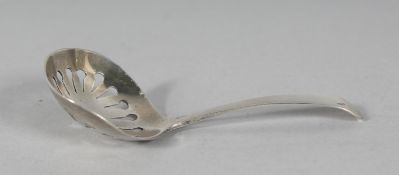 A GEORGE III PIERCED BOWL CADDY SPOON. London 1803.