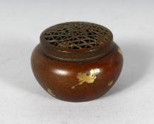 A MINIATURE CHINESE GOLD SPLASH CENSER. Impressed mark. 1.75ins diameter.